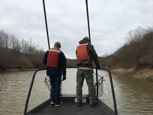 Peter Jenkins and Ian Booth work together finding muskellunge in Stonewall Jackson Lake for their research into muskellunge mortality rates.