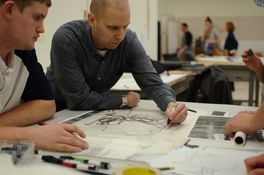 Landscape architect and alumnus Rob Dinsmore works with students during the 2016 charrette.  