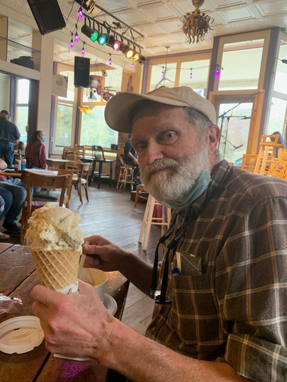 James Kotcon eating an ice cream cone.