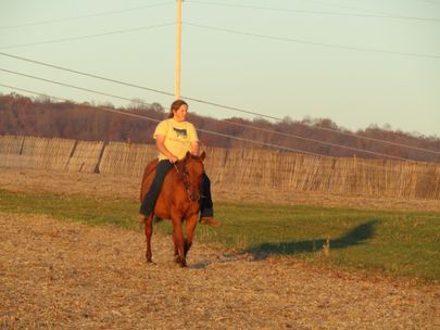 Margaret riding a horse