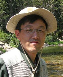 headshot of Dr. Park standing in river