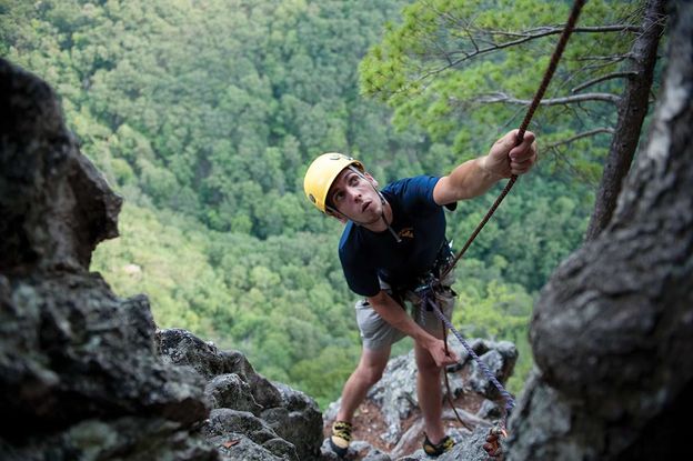 student climbing Seneca Rocks