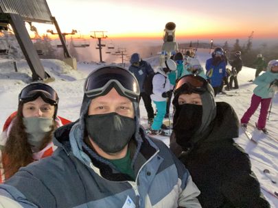 Chris Ashwell takes a picture at ski slopes.