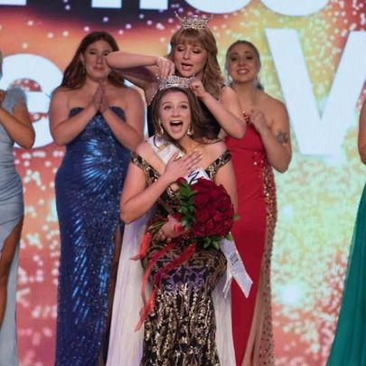 Young woman excited as she is crowned Miss West Virginia.