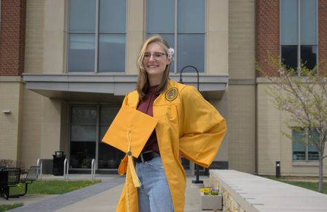 Photo of young woman graduate smiling