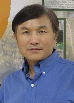headshot of Jinyang Deng
