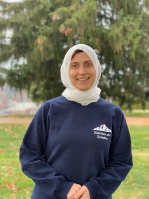 Heba Mountaser wearing a Nutrition and Dietetics sweatshirt